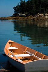 Small Peach Rowboat on Coast of Maine