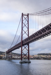 Obraz premium Lisbon, the 25 of April bridge, Tagus River, Portugal