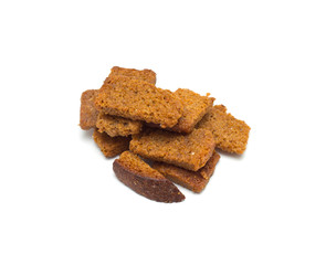 Many small salty dried rusks isolated on white