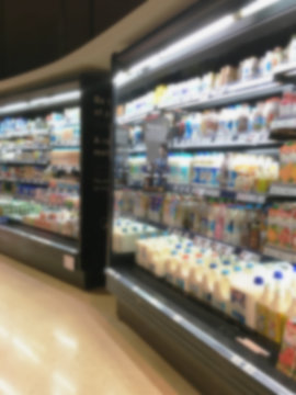 Selection Of Yogurts, Soy Milk And Milk On The Shelves In A Supermarket