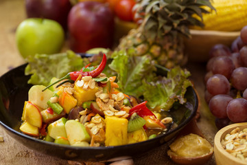 kitchen table with spicy papaya salad and ingredient food Thai national food concept of hot asian food