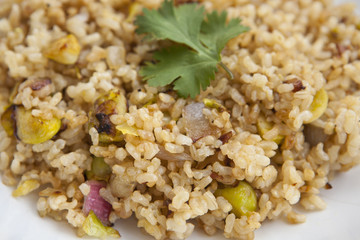 cooked integral rice with vegetables, closeup