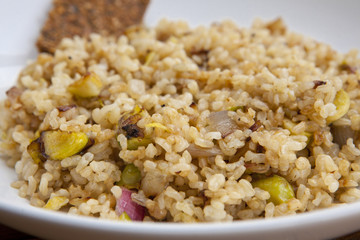 cooked integral rice with vegetables, closeup