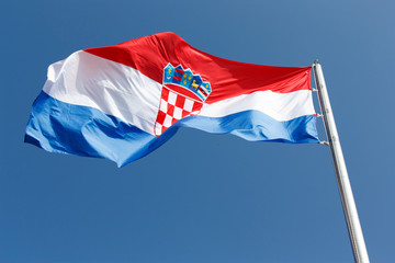 Flag, national symbol of Croatia against the blue sky.