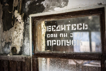 sign on a window in Pripyat, Chernobyl