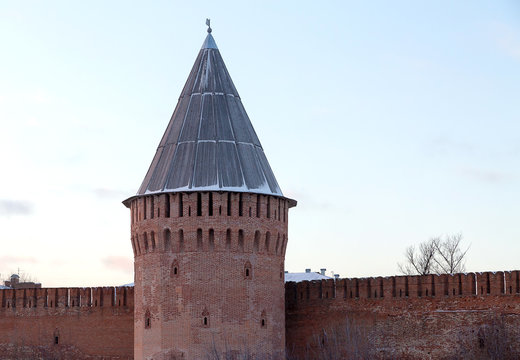 Russia Smolensk Kremlin part of the old fortress wall thunder tower with a wooden roof in the shape of a cone