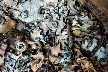 abandoned school room with trash and masks on the floor in Pripyat, Chernobyl, Ukraine