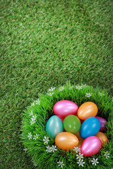 Fototapeta na wymiar Easter eggs on meadow