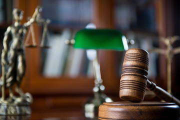 Law Concept. Judges Gavel And Scale Of Justice. wooden desk, books