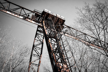 rusty crane on rails