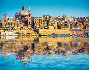 Fototapeta na wymiar scenic View of Marsamxett Harbour and Valletta in Malta with reflection