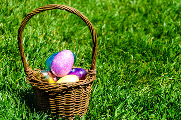 Easter eggs on the grass background