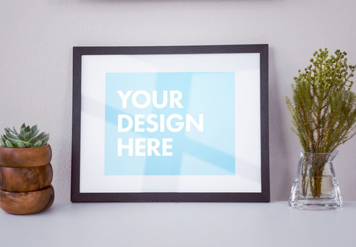 Black Photo/Art Frame on Display Mockup 4