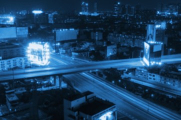 Obraz premium abstract blurred night city background, blue color tone effect.