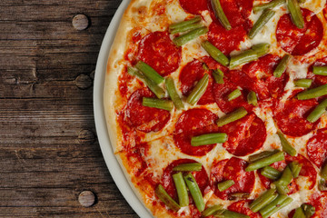 Top view of half of pizza pepperoni