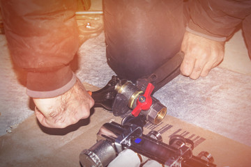 Assembling the heating system for the house, plumbing works