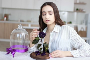 Young girl with flower