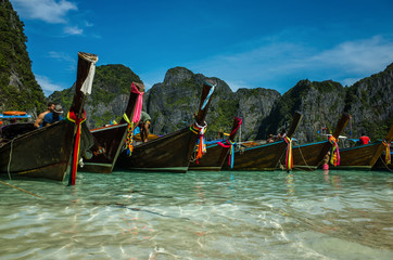 Fototapeta na wymiar Boats on the beach of Koh Phi Phi, Thailand