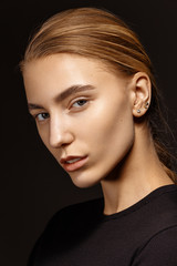 Close up portrait of beautiful young woman  in black leotard