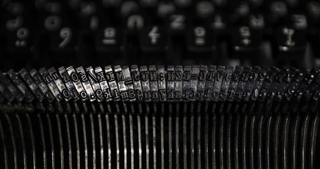 Old and dirty typewriter close up background