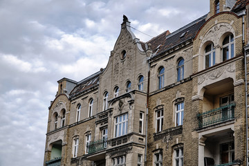 Fototapeta na wymiar The facade of red brick building in Poznan.