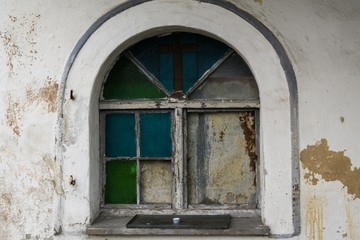 Window of old broken abandoned building. Slovakia