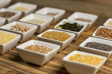Assortment of legumes, grain and seeds. Various types of grains, rice, legumes spices and herbs