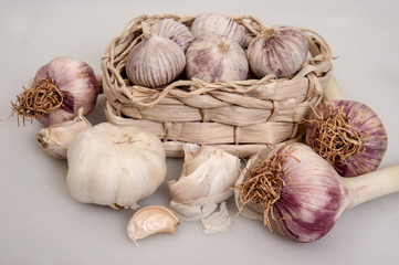 Tibetan garlic in a basket of garlic leaves  and fresh garlic