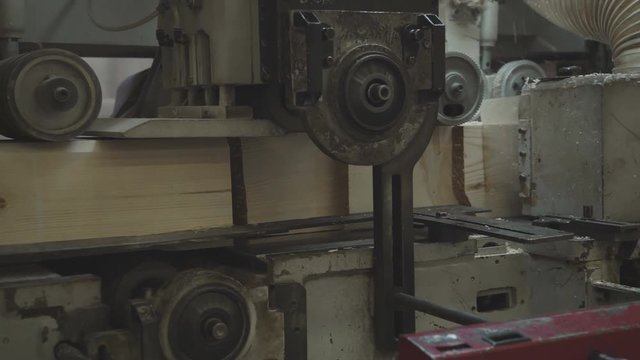 The production line for wood. Woodworking industry: machinery and equipment for cutting and grinding lamellae. Production of laminated veneer lumber.LVL Laminated Veneer Lumbe.