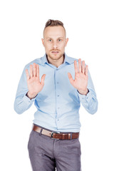 businessman making stop sign with hand. emotions and people concept.