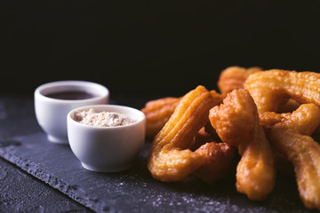 Traditional Spanish and Mexican dessert churros with hot chocolate