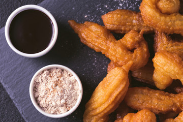 Traditional Spanish and Mexican dessert churros with hot chocolate