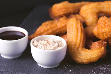 Traditional Spanish and Mexican dessert churros with hot chocolate