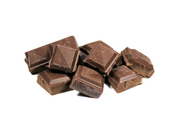 Close-up of Dark Chocolate Cubes Isolated on White Background 