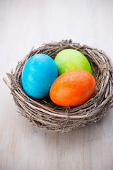 Easter eggs in the nest. Spring discount card.