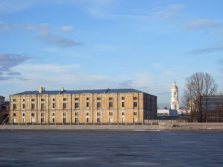 Fototapeta premium The building of the Military-Space Cadet Corps named after Peter the Great. The majestic building is reflected in the Neva