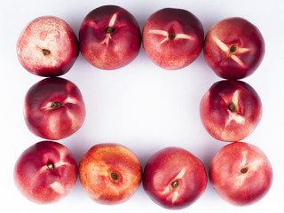 Nectarine on a white background built in a square