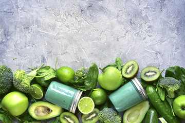 Green detox smoothie with ingredients for making.Top view with space for text.