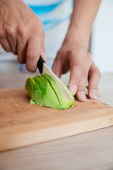 Avocado Being Cut