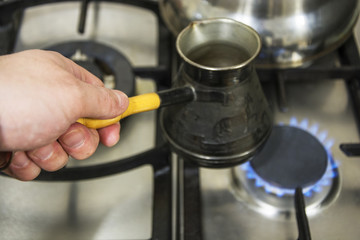 Preparation of hot coffee on naked flame
