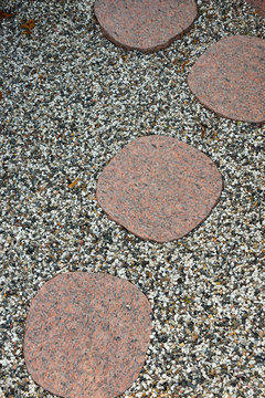round stepstones on gravel