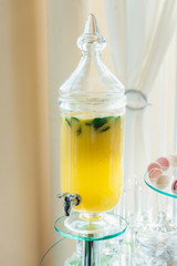 Yellow healthy drink. Glass jar