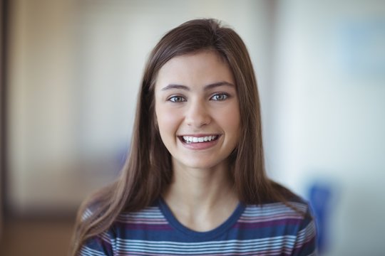 Portrait of smiling schoolgirl - Powered by Adobe