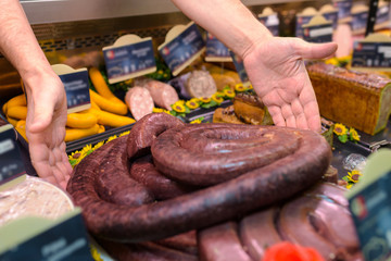 presenting the sausage