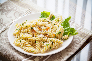 italian pasta fussili with cheese and vegetables
