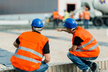 Construction workers working on construction site