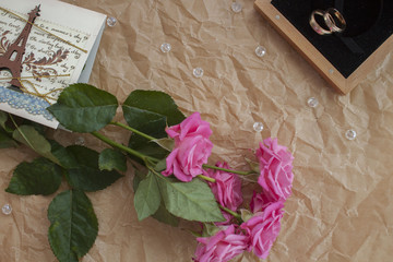 pink roses,  card and  ring