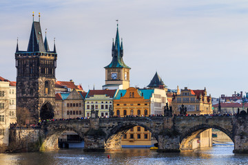 Fototapeta na wymiar View of Charles Bridge (Karluv most) and Old Town Bridge Tower, Prague, Czechia
