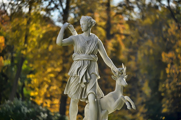 A statue of the mythological huntress Diana. - 141808892
