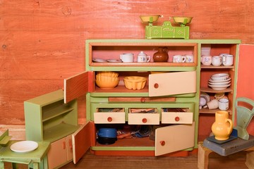 Obraz na płótnie Canvas Vintage toys for girls. Wooden toy kitchen